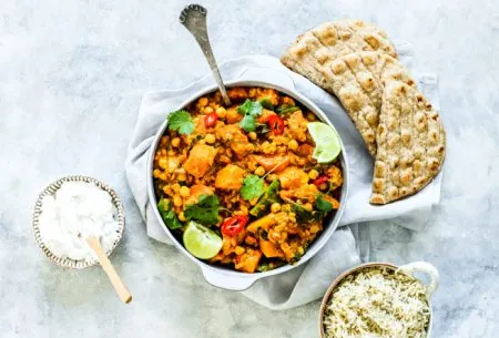 One large pot of mixed lentil & butternut squash dahl, served with sides of rice and flatbreads