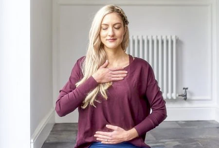 Megan Rossi breathing with hand on heart and hand on stomach
