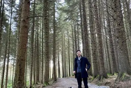 Man and dog in forest