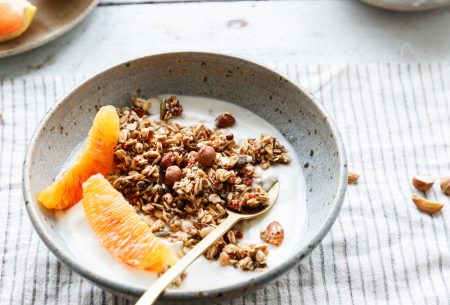 View Vitamin C supplements: fad or fact? Bowl of yogurt, granola and orange segments