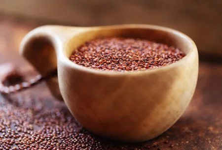 A wooden bowl of teff