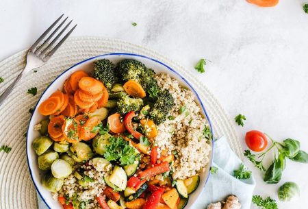 View The Pegan diet: what is it & why I wouldn’t recommend it A colourful bowl of food including quinoa, roasted mixed peppers, courgette, carrot, brussell sprouts and broccoli on a place mat with a napkin and piece of ginger