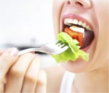 Person eating a plant-based meal