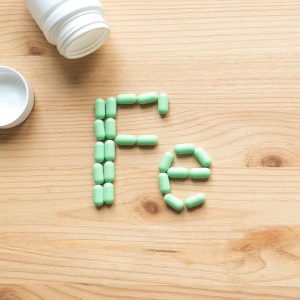 A photo of Iron pills spelling out 'Fe'