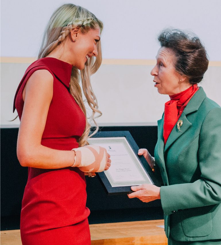 Megan Rossi receiving an award from Princess Anne