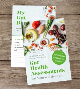 My Gut Diary and Gut Health Assessments books on a wooden table