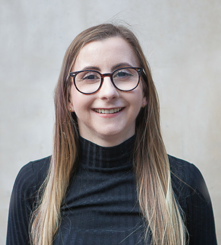Photo of Chloe Elliott smiling at the camera