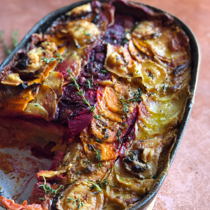 Photo of a root vegetable gratin on a kitchen worktop