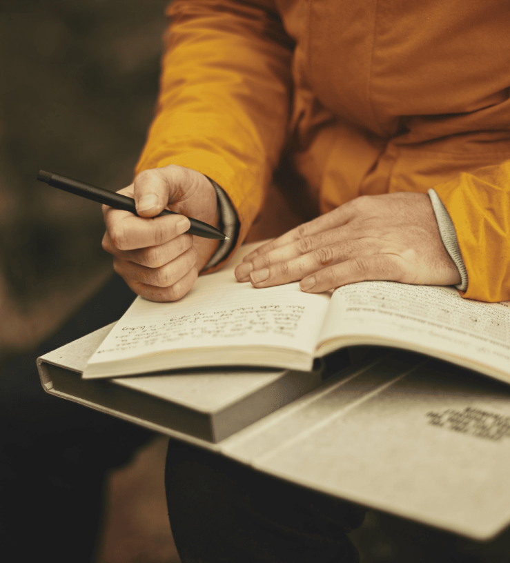 Person writing down things they are grateful for