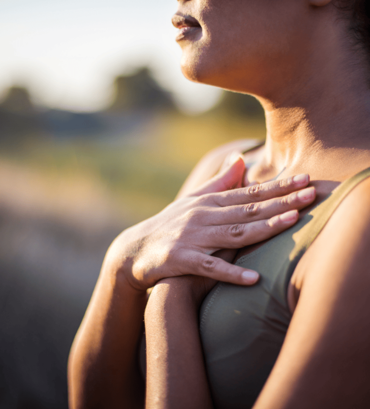 Person focusing on their breathing to reduce stress and promote immune health